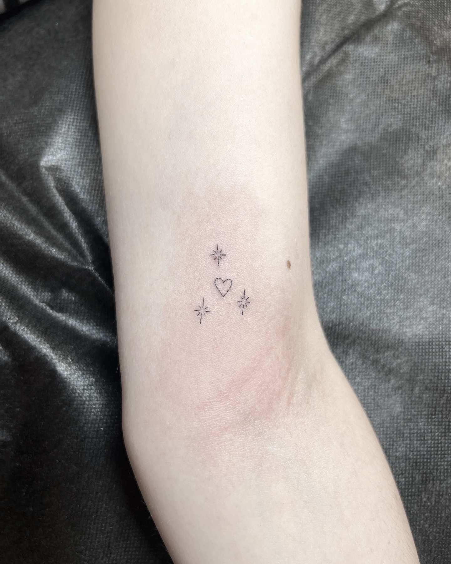 Fine line tattoo by Stephen Carballo